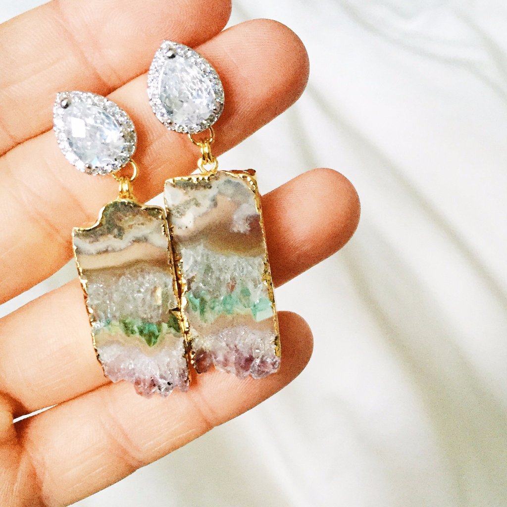 amethyst statement earrings in hand for bohemian bride