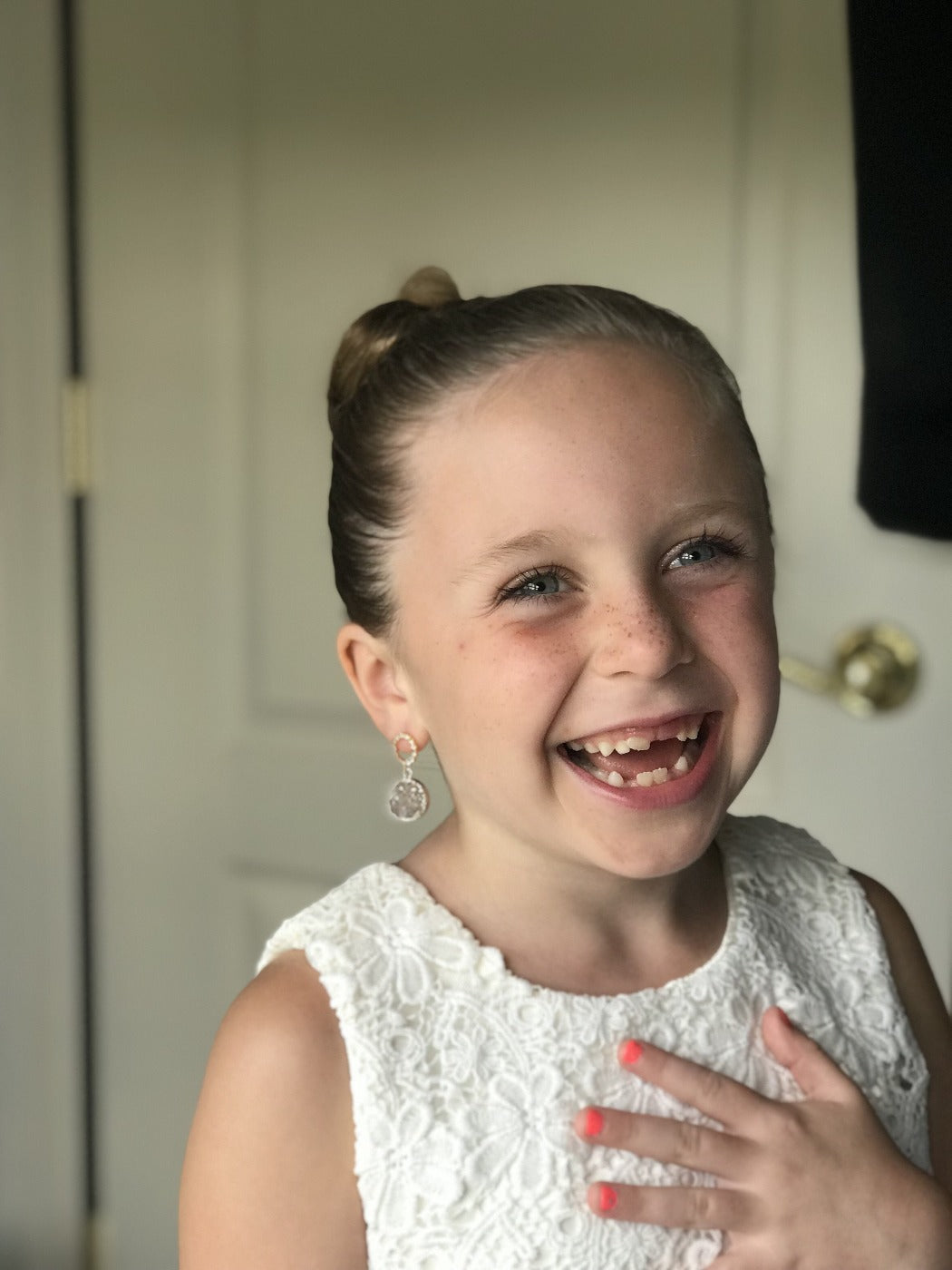 drusy earrings on a flower girl