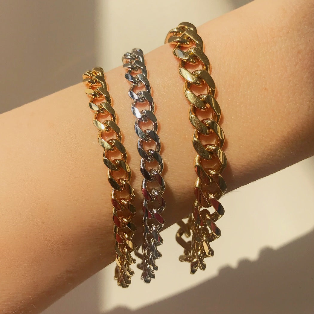 Rachel Mulherin basic gold and silver layered curb chain bracelets