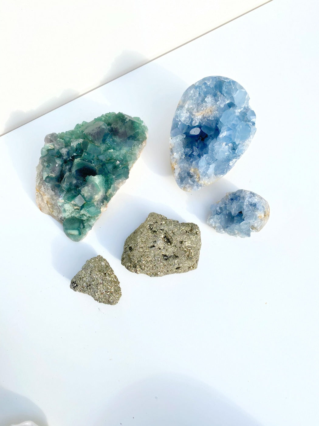 holy glam celestine crystal flourite and pyrite stones as home decor