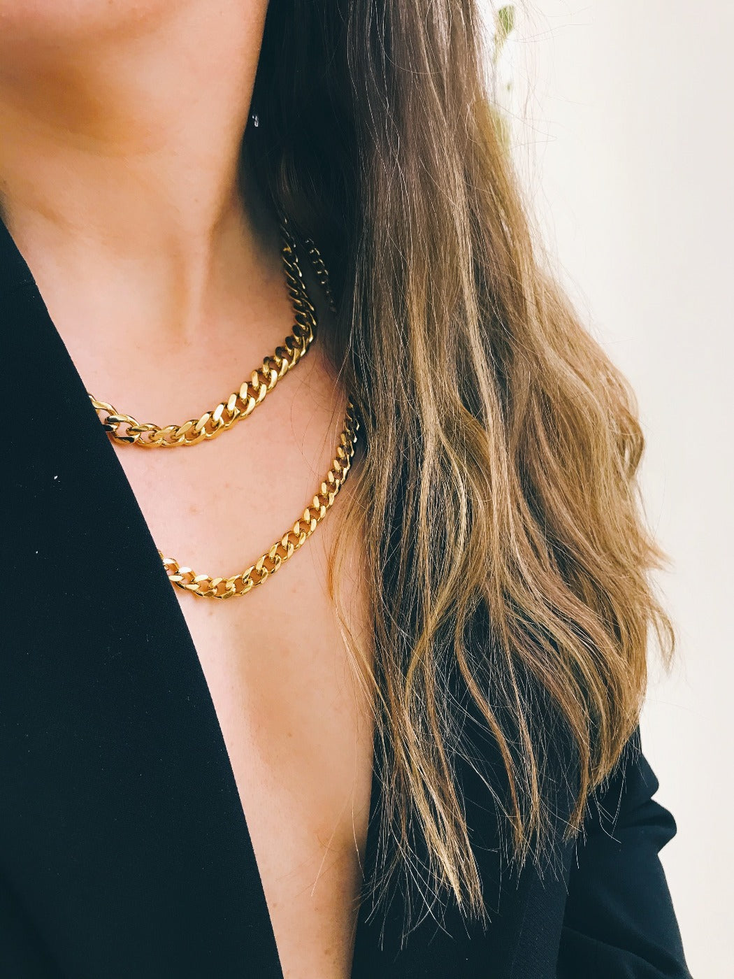 Rachel Mulherin basic gold layered curb chains on neck
