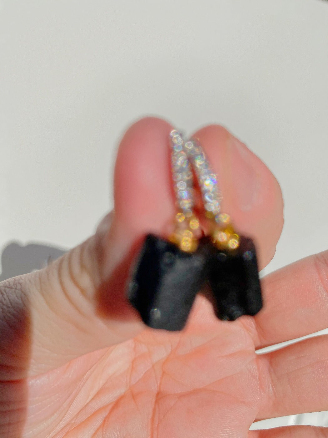 black tourmaline and gold wire wrapped cz huggie earring