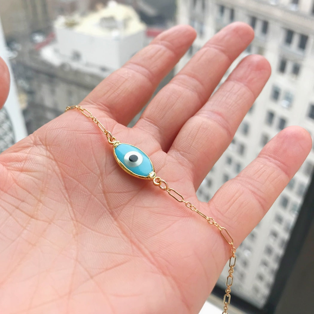 turquoise blue evil eye necklace in gold
