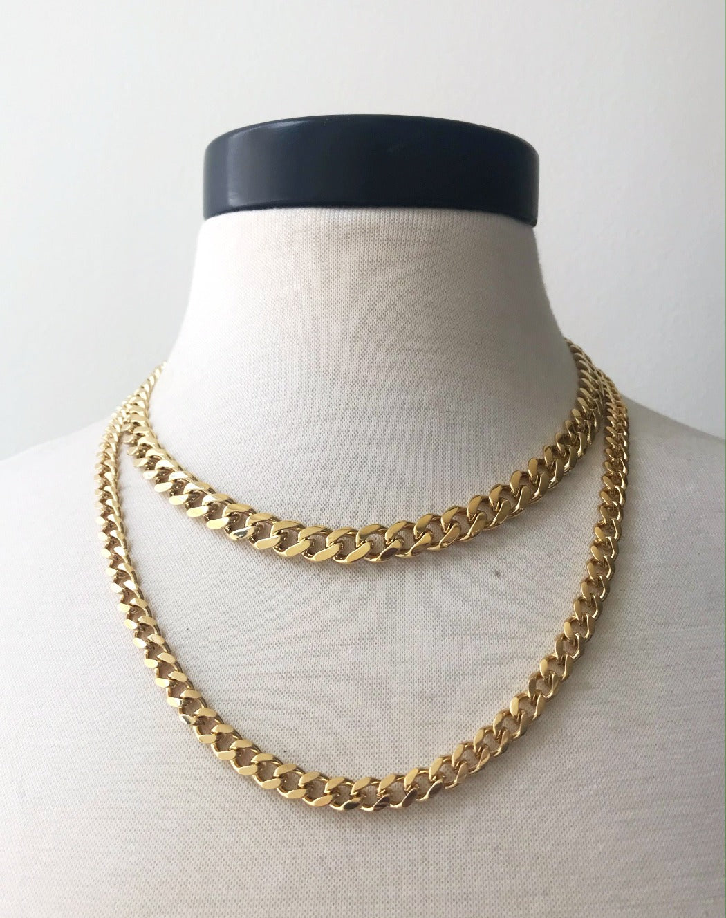 Rachel Mulherin basic gold layered curb chains on neck