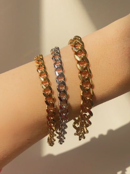 Rachel Mulherin basic gold and silver layered curb chain bracelets