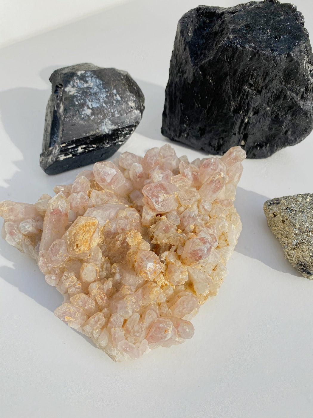 black tourmaline and strawberry quartz large crystals as home decor